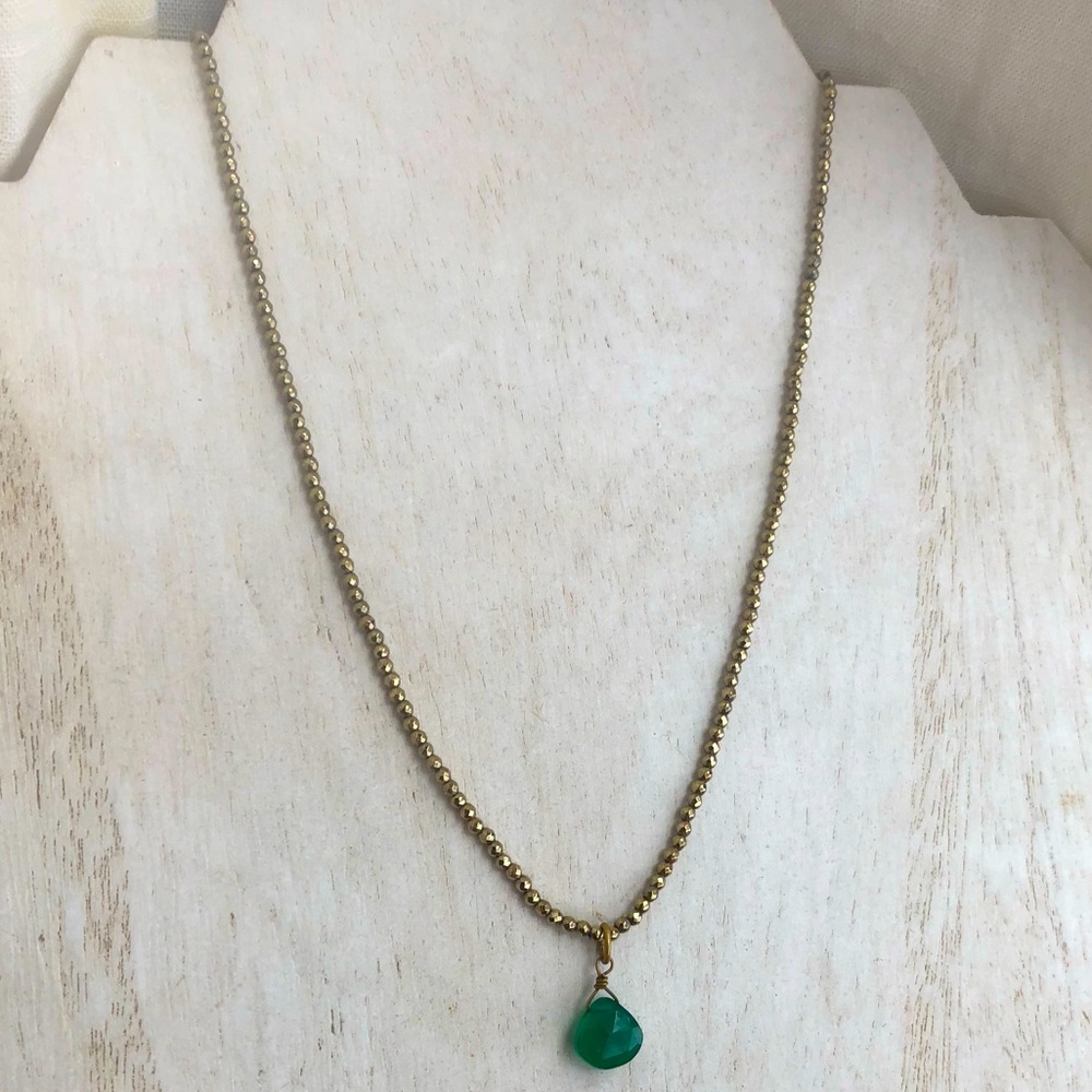 Copper beaded necklace with green stone pendant
